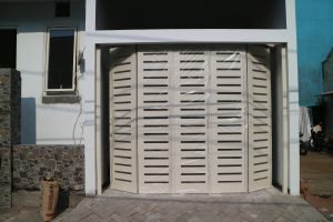 rel pintu garasi malang