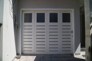 rel pintu garasi surabaya