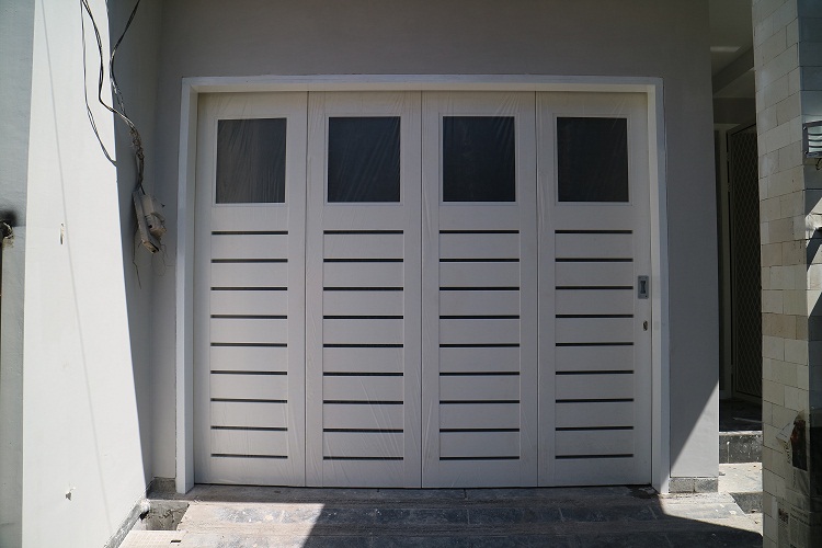 rel pintu garasi surabaya