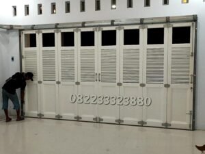 rel pintu garasi jombang