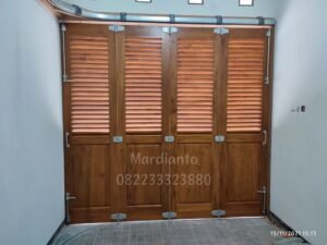 rel pintu garasi mojokerto